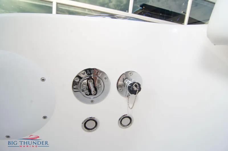  Yacht Photos Pics 2023 Fountain 34 CC boat waste management system with chrome fittings.