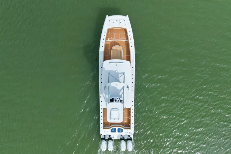  Yacht Photos Pics Aerial view of 2025 Freeman LR yacht on green water.