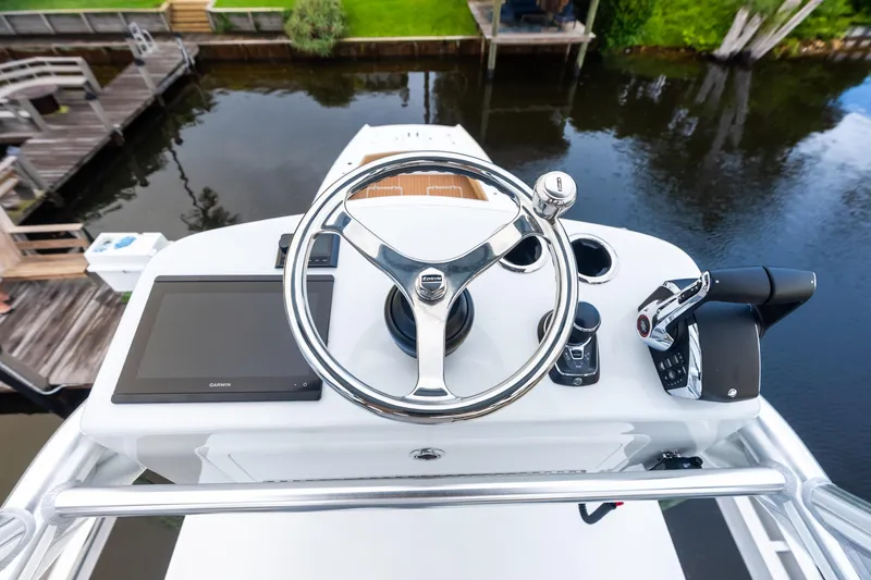  Yacht Photos Pics Steering console of 2025 Freeman LR boat with Garmin navigation system.