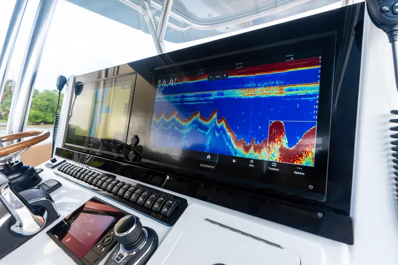  Yacht Photos Pics Freeman LR 2025 boat dashboard with advanced Garmin navigation display.
