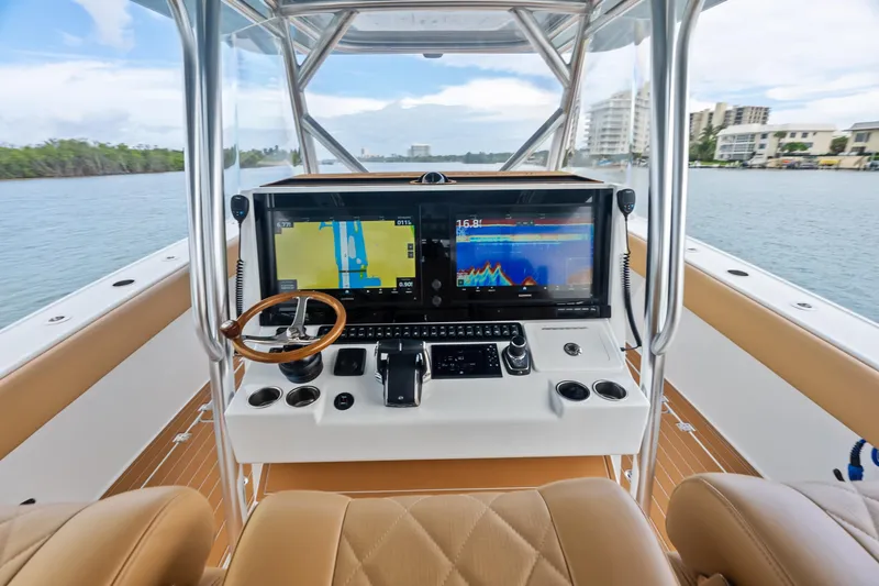  Yacht Photos Pics Helm of 2025 Freeman LR boat with advanced navigation screens and controls.