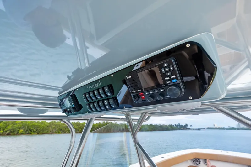  Yacht Photos Pics 2025 Freeman LR boat console with advanced navigation and communication systems on a sunny day.