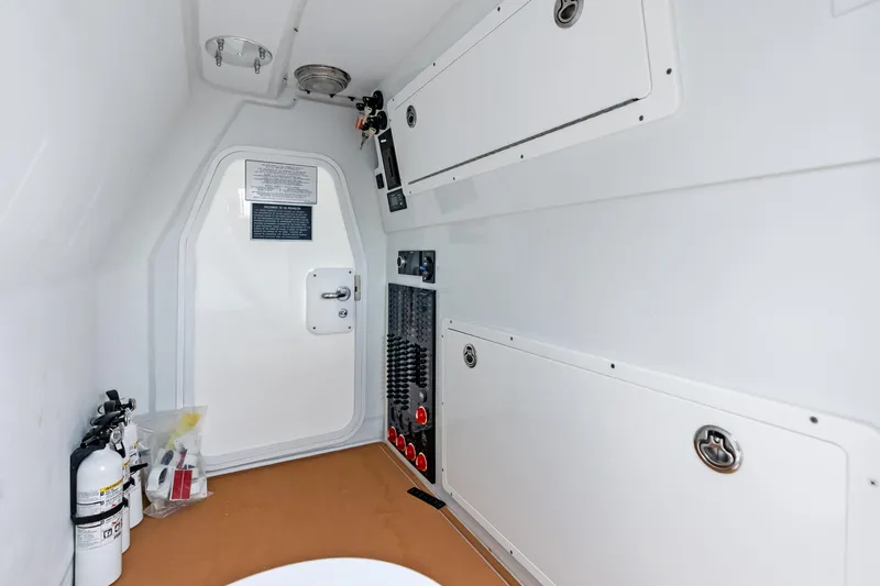  Yacht Photos Pics Interior of 2025 Freeman LR boat with storage compartments and safety equipment.