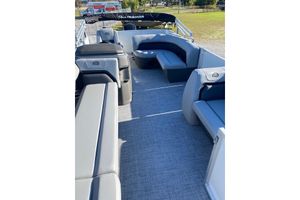 2026 Sun Tracker Party Barge 18 DLX interior with spacious seating and modern design.