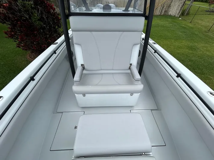  Yacht Photos Pics 2024 Contender 28 Tournament boat interior with sleek white seating and modern design.