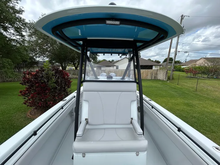  Yacht Photos Pics 2024 Contender 28 Tournament boat with sleek seating and modern design.