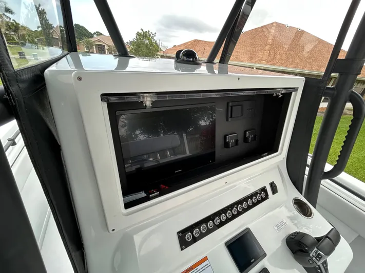  Yacht Photos Pics 2024 Contender 28 Tournament boat dashboard with modern controls and navigation system.