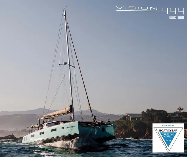 Vision 444 Yacht Photos Pics Sailing yacht Vision 444 cruising near rocky coastline, 2026 model, awarded Boat of the Year 2024.