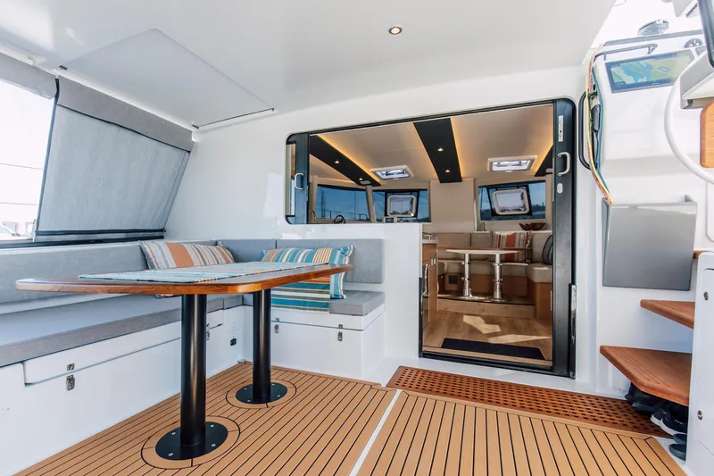 Vision 444 Yacht Photos Pics Modern Vision 444 yacht interior, 2026 model, featuring sleek design and comfortable seating area.