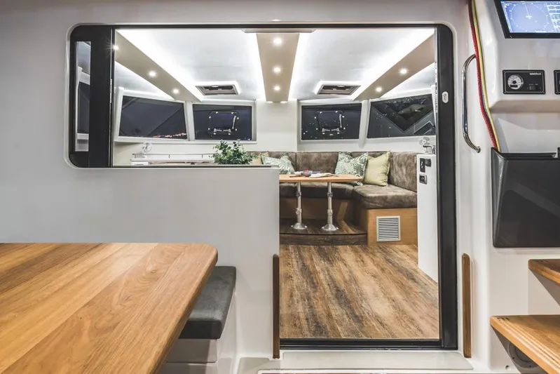 Vision 444 Yacht Photos Pics Modern Vision 444 yacht interior, featuring sleek design, wood flooring, and comfortable seating, 2026 model.