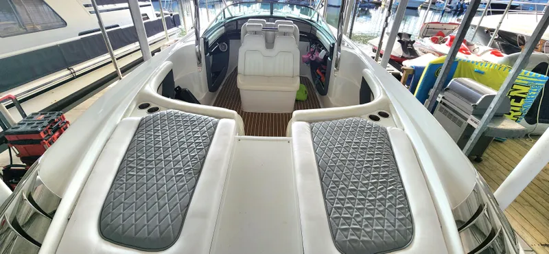  Yacht Photos Pics 2007 Cobalt 343 boat interior with cushioned seating and sleek design.
