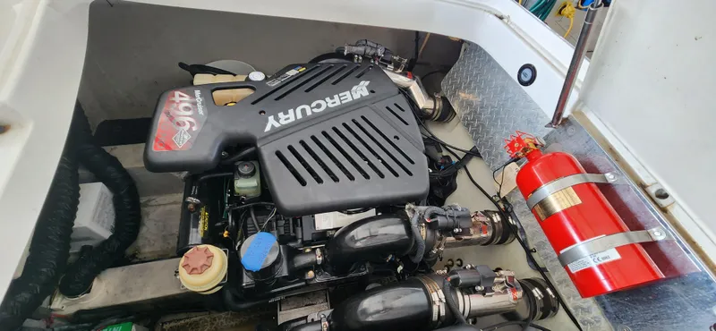  Yacht Photos Pics 2007 Cobalt 343 engine compartment with Mercury engine and fire extinguisher.
