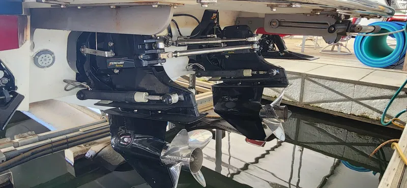  Yacht Photos Pics 2007 Cobalt 343 boat with dual outboard motors in a marina setting.