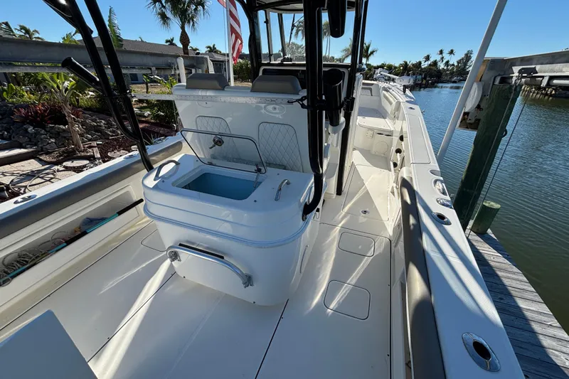  Yacht Photos Pics 2023 World Cat 295 CC boat interior with open deck and seating area.