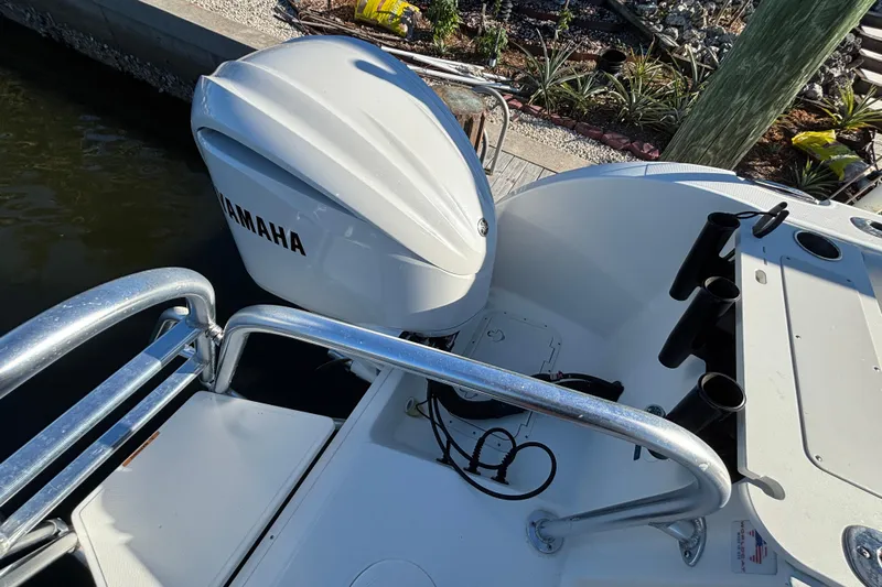  Yacht Photos Pics 2023 World Cat 295 CC boat with Yamaha outboard engine at dockside.