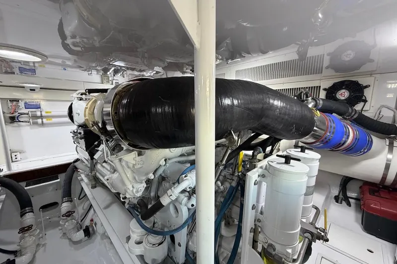 Breakaway Yacht Photos Pics Engine room of 2004 Viking 56 Convertible yacht, showcasing detailed mechanical components.