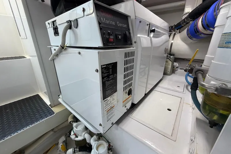 Breakaway Yacht Photos Pics Engine room of 2004 Viking 56 Convertible yacht with marine generator and equipment.