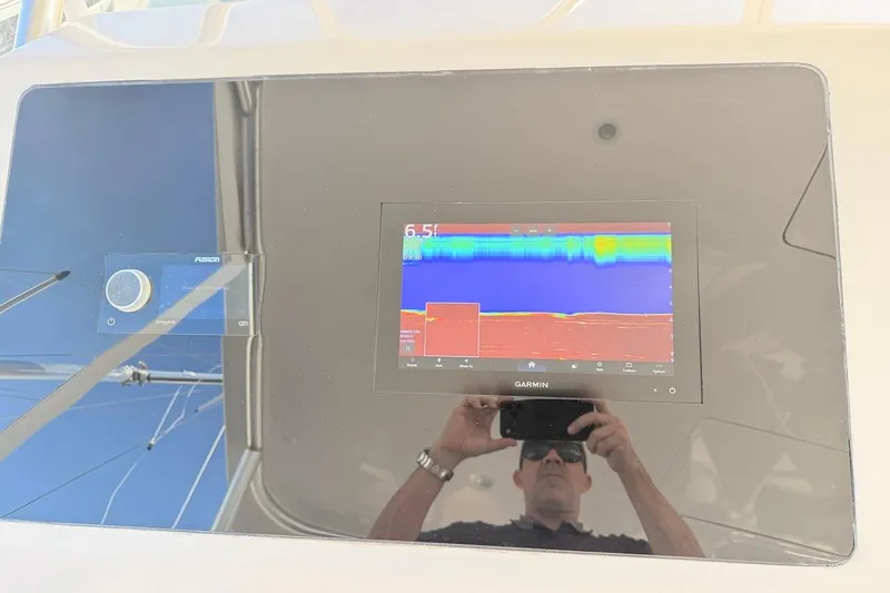 Breakaway Yacht Photos Pics Garmin display on 2004 Viking 56 Convertible yacht dashboard, showing sonar data.
