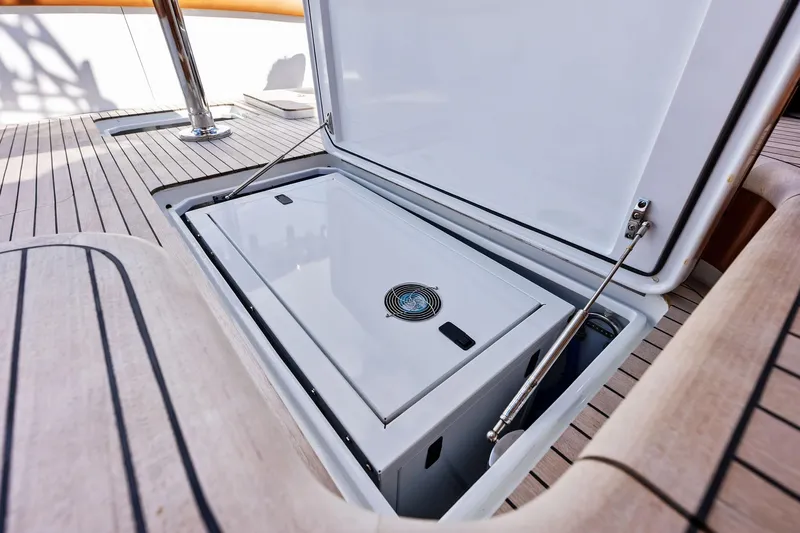 Nic-nac Yacht Photos Pics Open storage compartment on 1977 Merritt Sportfish boat deck.