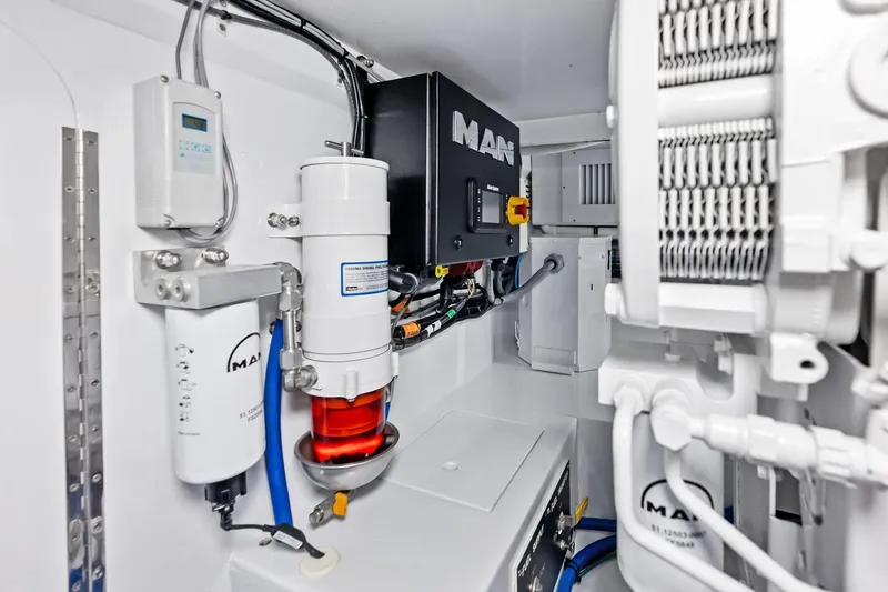 Nic-nac Yacht Photos Pics Engine room of a 1977 Merritt Sportfish boat with MAN equipment and filters.