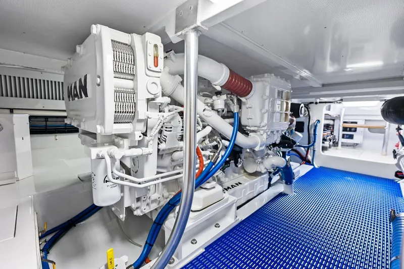 Nic-nac Yacht Photos Pics Engine room of a 1977 Merritt Sportfish boat with MAN engine components.