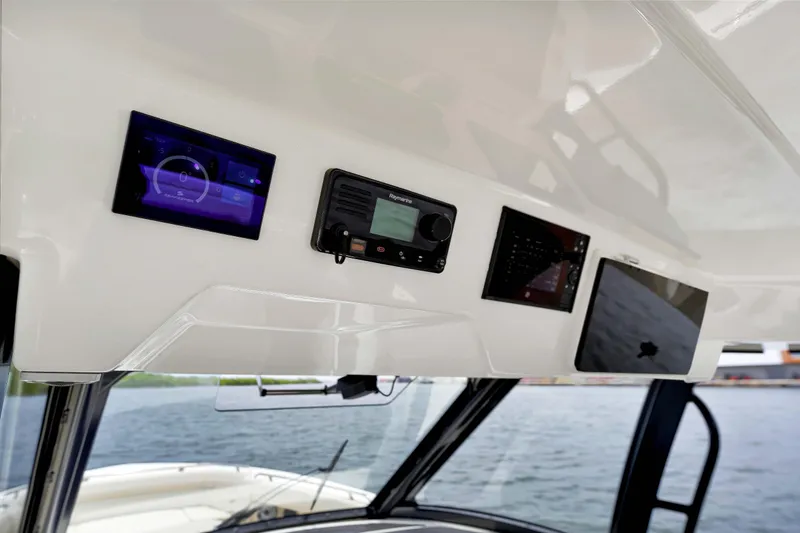  Yacht Photos Pics 2023 Boston Whaler 350 Realm dashboard with modern navigation and control systems.