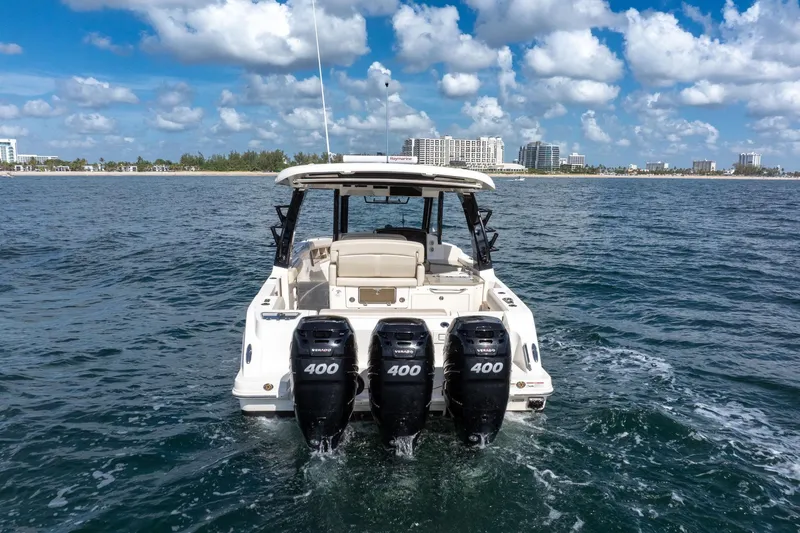  Yacht Photos Pics 2023 Boston Whaler 350 Realm with quad 400 engines on open water.