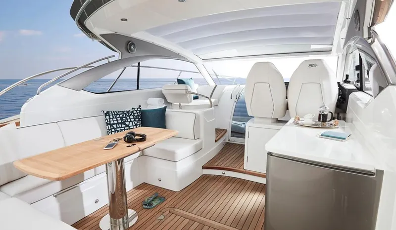  Yacht Photos Pics Luxurious 2025 Princess V40 yacht interior with elegant seating and modern amenities.