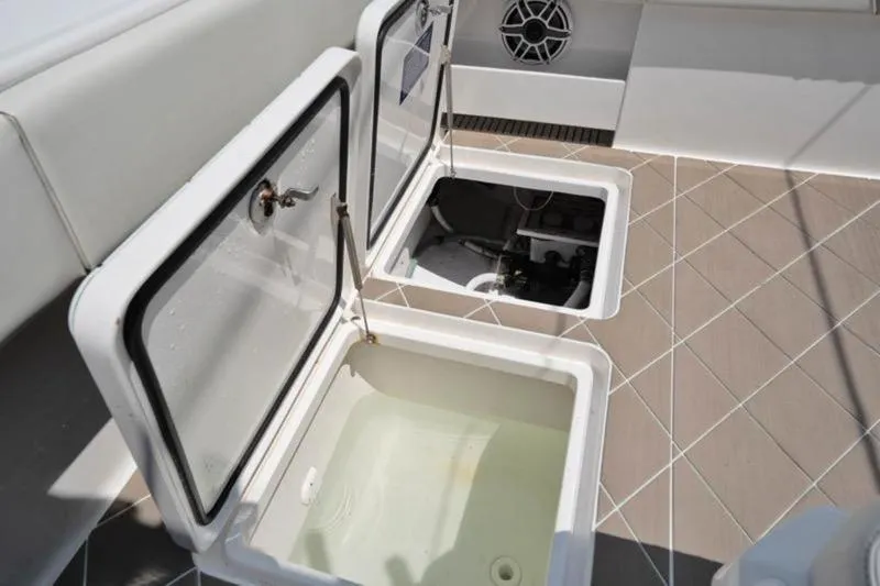  Yacht Photos Pics Open storage compartments on a 2020 Invincible 37' Catamaran boat.