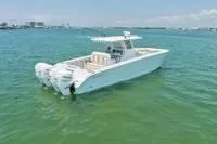  Yacht Photos Pics 2020 Invincible 37' Catamaran on open water.
