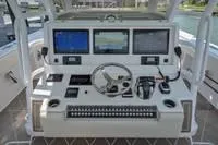  Yacht Photos Pics 2020 Invincible 37' Catamaran helm with advanced navigation systems and controls.