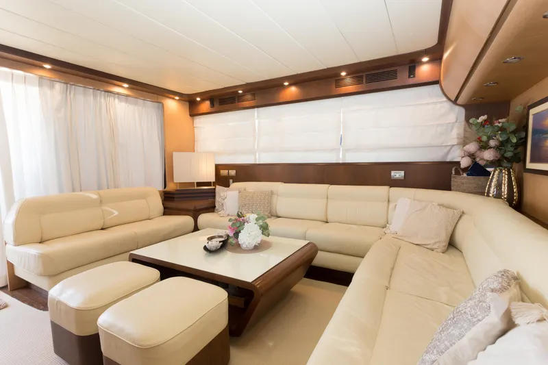  Yacht Photos Pics Luxurious interior of a 2008 Maiora 20S yacht with elegant cream seating and decor.