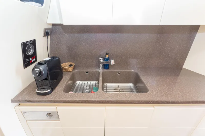  Yacht Photos Pics Kitchen area in 2008 Maiora 20S yacht with coffee machine and dual sink.