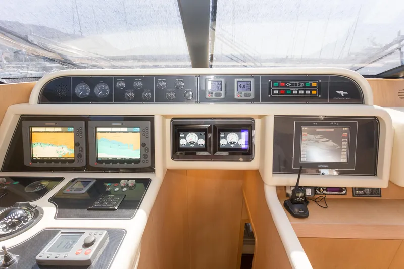  Yacht Photos Pics Control panel of a 2008 Maiora 20S yacht with navigation and monitoring systems.