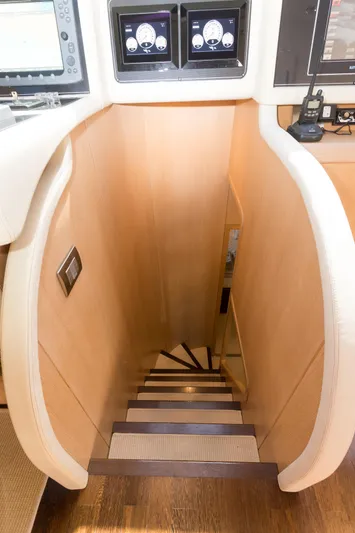  Yacht Photos Pics Staircase inside 2008 Maiora 20S yacht, featuring modern design and control panels.