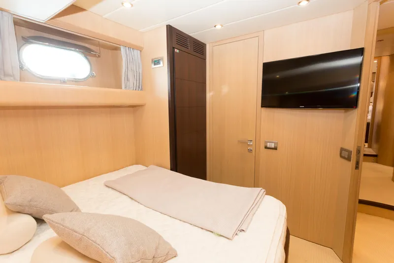  Yacht Photos Pics Luxurious cabin interior of 2008 Maiora 20S yacht with modern amenities.