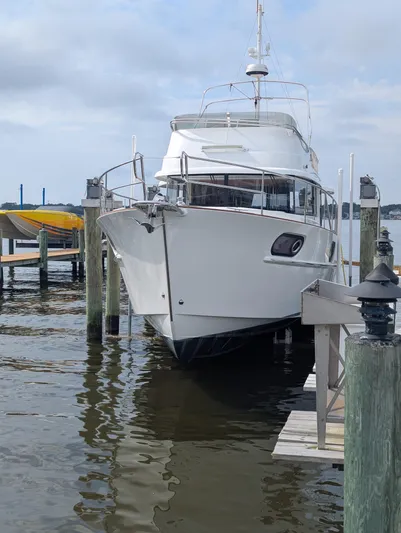  Yacht Photos Pics 2019 Beneteau Swift Trawler 44 docked at a marina, front view.