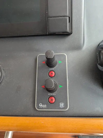  Yacht Photos Pics Control panel of a 2019 Beneteau Swift Trawler 44 with joystick controls.