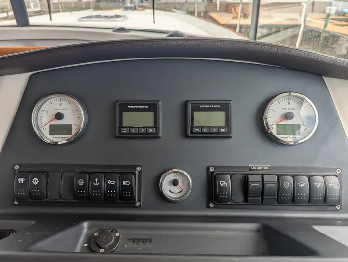  Yacht Photos Pics Control panel of a 2019 Beneteau Swift Trawler 44 with Volvo Penta gauges and switches.