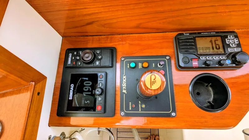 Luna Yacht Photos Pics Control panel of a 2000 Hinckley Picnic Boat with navigation and communication equipment.