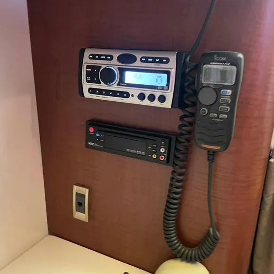 Reel Inspired Yacht Photos Pics 2009 Boston Whaler 345 Conquest cabin electronics, featuring a radio and communication system.