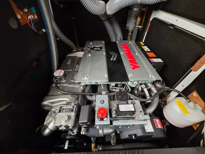 Yachting Conseil Yacht Photos Pics Engine compartment of 2023 Jeanneau 60 yacht, featuring a Yanmar engine.