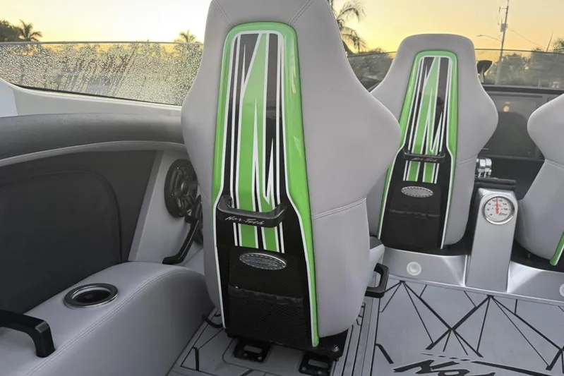  Yacht Photos Pics 2026 Nor-Tech 4000 Roadster interior with green-accented seats and modern design elements.