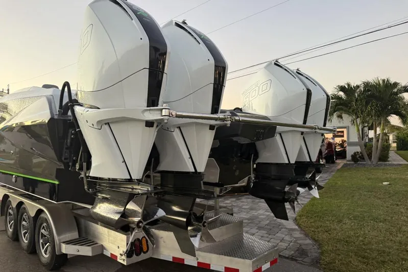  Yacht Photos Pics 2026 Nor-Tech 4000 Roadster with powerful outboard engines on a trailer.