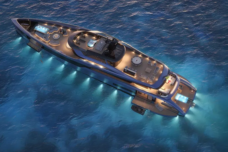  Yacht Photos Pics Luxurious 2028 Picchiotti P53 yacht illuminated on serene ocean waters at night.