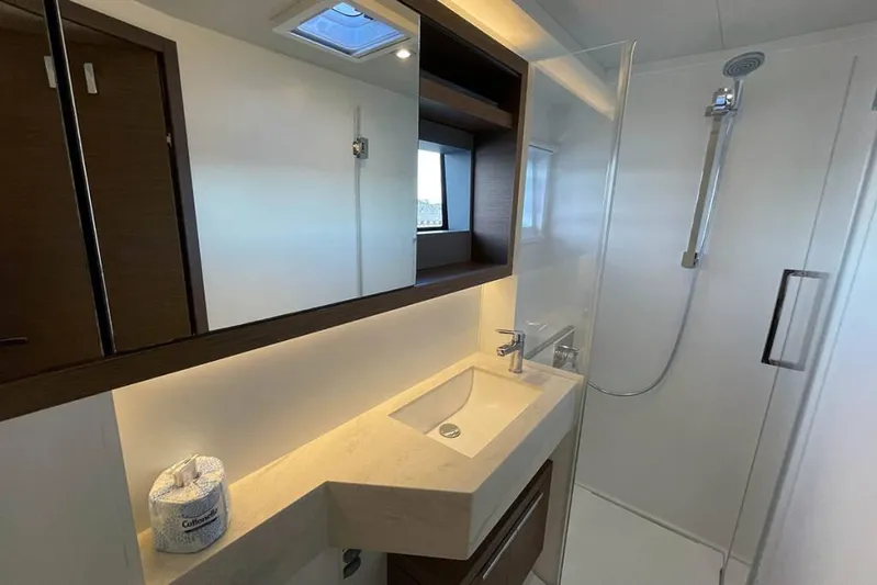 VI La Ut Yacht Photos Pics Modern bathroom interior of 2019 Lagoon 50 yacht with shower and sink.