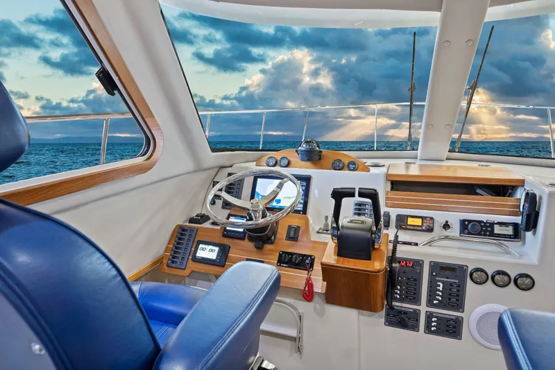  Yacht Photos Pics Helm of 2026 Aspen C100 yacht with ocean view and navigational equipment.