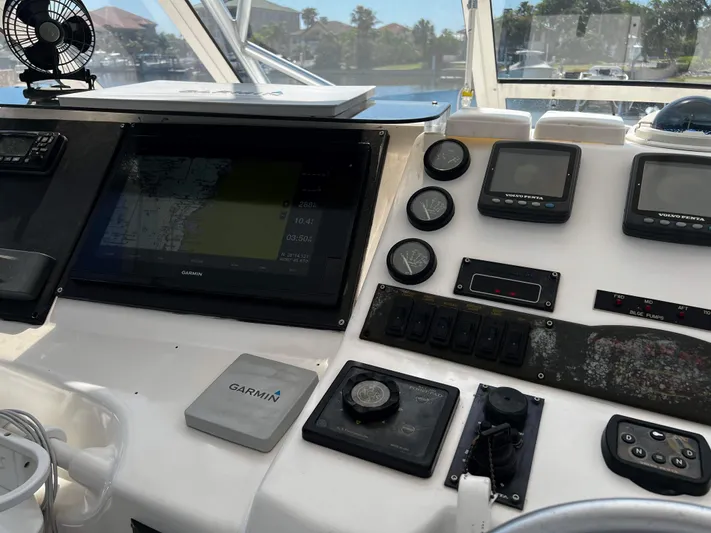 The Boo Factor Yacht Photos Pics Control panel of a 2003 Ocean 40 Super Sport boat with Garmin navigation system.