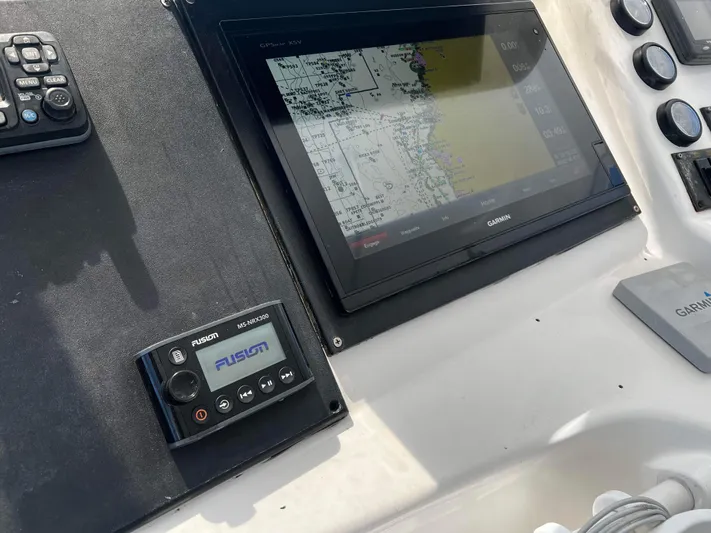 The Boo Factor Yacht Photos Pics Control panel of a 2003 Ocean 40 Super Sport with Garmin navigation system.