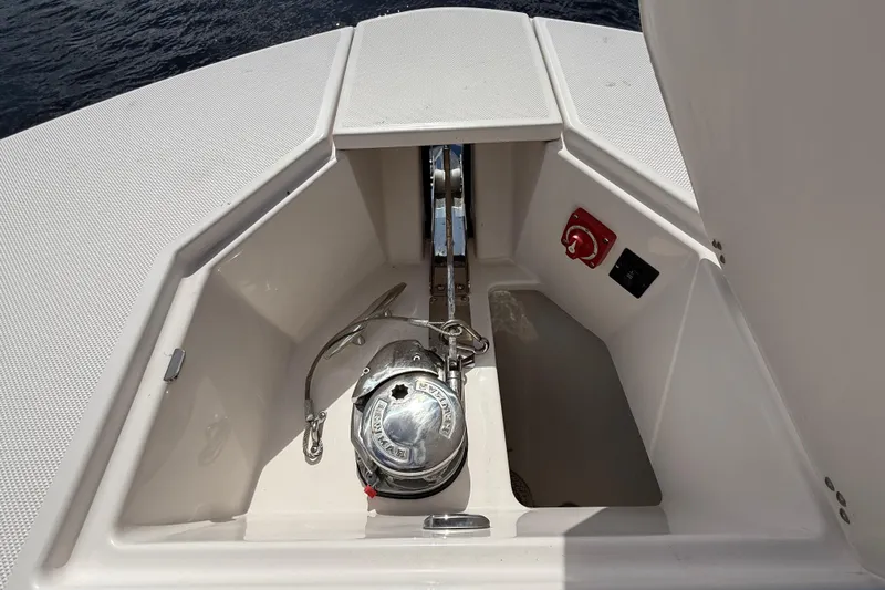  Yacht Photos Pics 2020 Regal 38 SAV boat anchor compartment with winch and control panel.